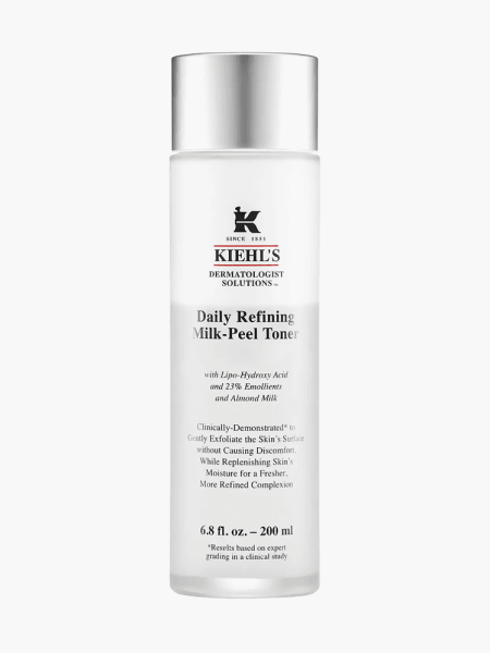 Milk-Peel Gentle Exfoliating Toner in branded clear bottle with silver cap on light gray background